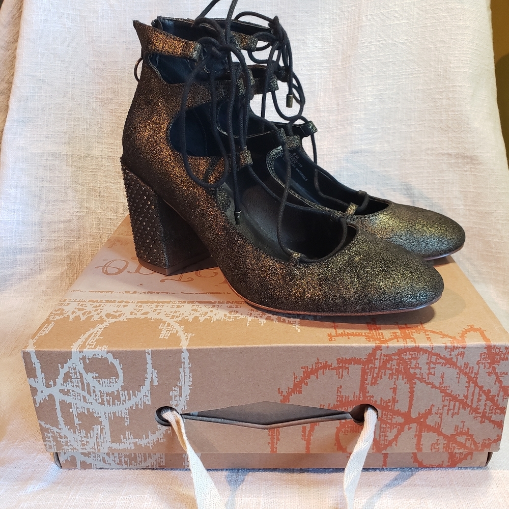 Latigo Black and Gold Leather Ankle Boots with Cut-Out Details
